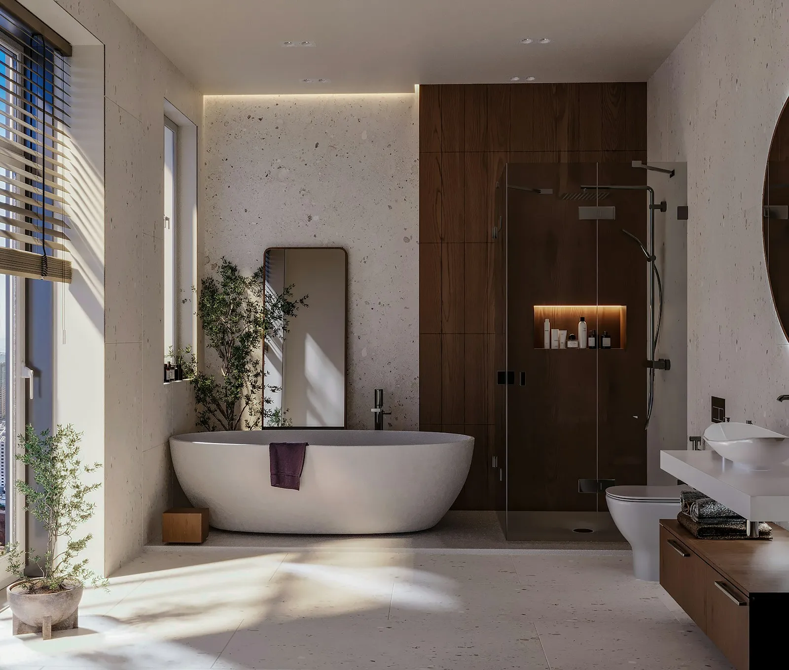Modern ausgebautes Bad mit freistehender Wanne und Dusche